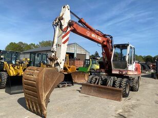 O&K MH 5 wheel excavator